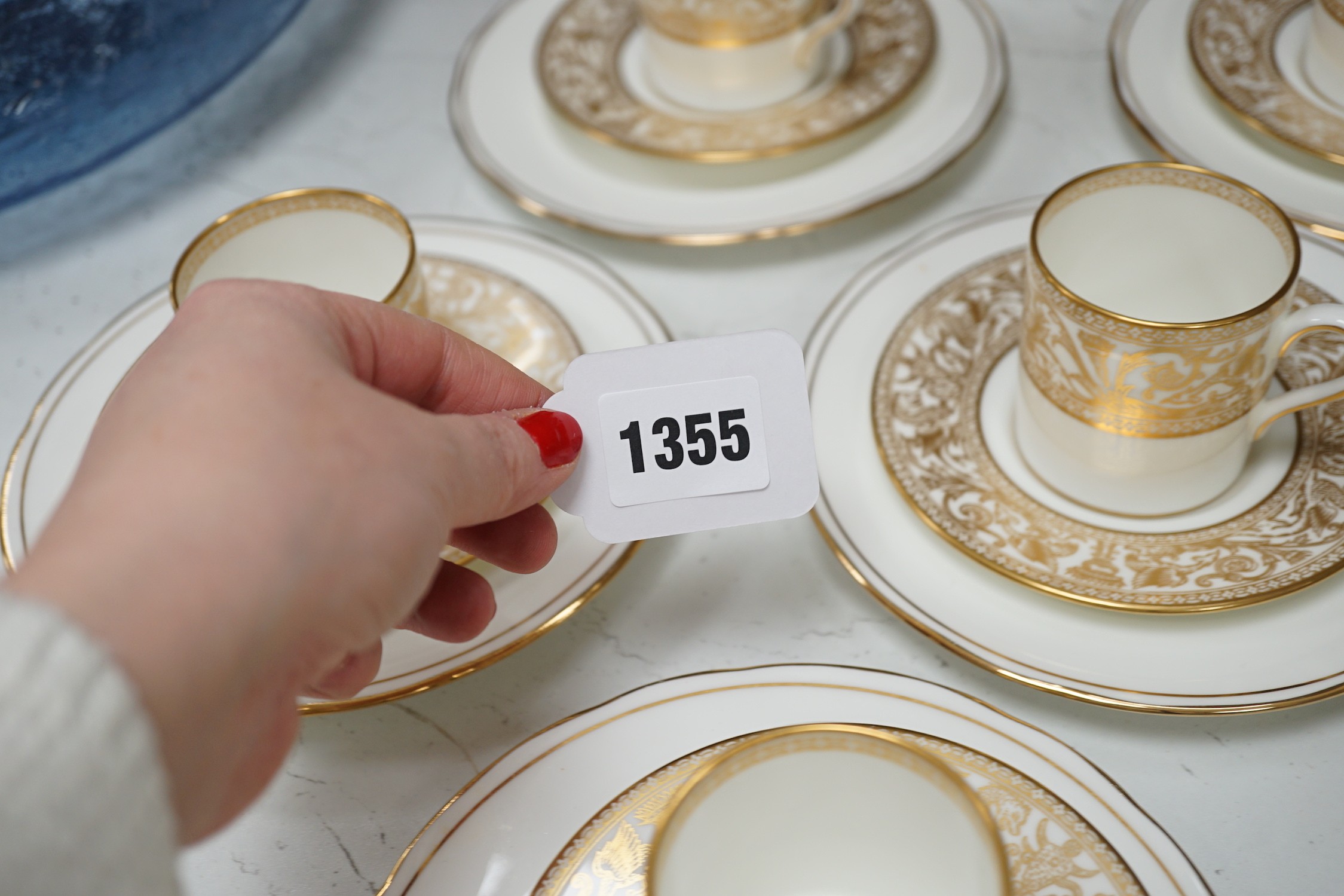 A Victorian Wedgwood part dinner service, with black printed classical borders, together with two Minton meat dishes and a Wedgwood gilt bordered coffee service.